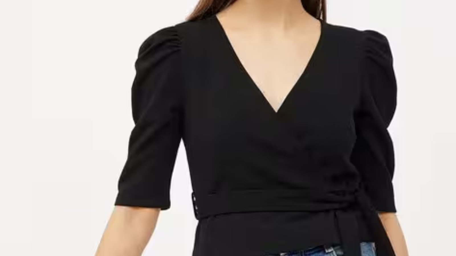 Black wrap top featuring a stylish V-neck design, perfect for both casual and formal occasions.