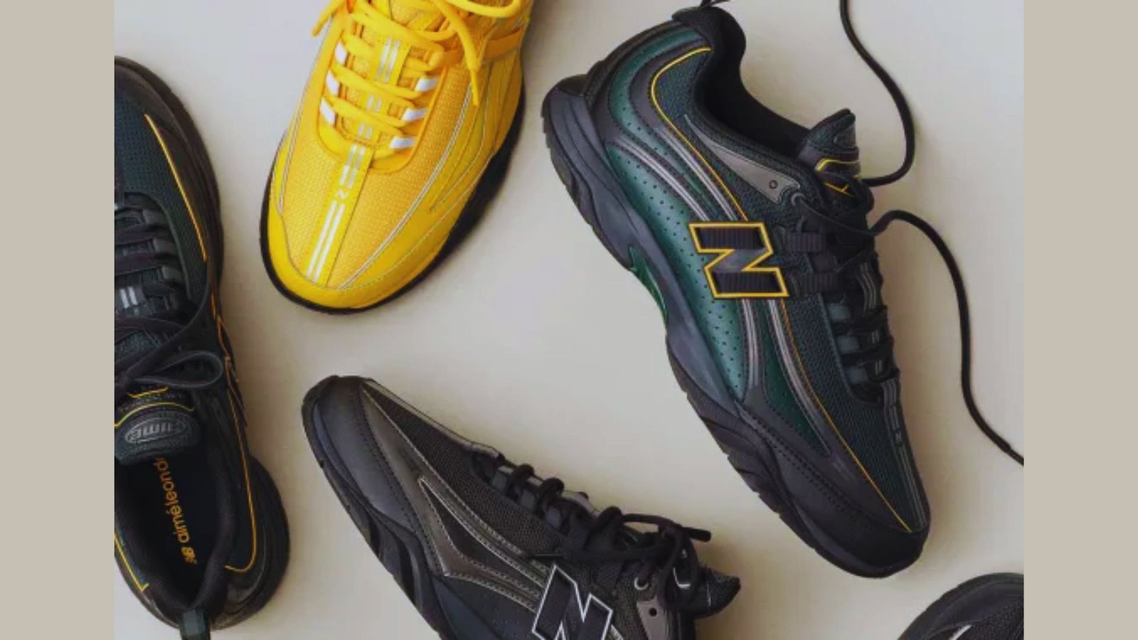 New Balance and Aimé Leon Dore collaboration sneaker, highlighting a distinctive design with multiple brand logos.

