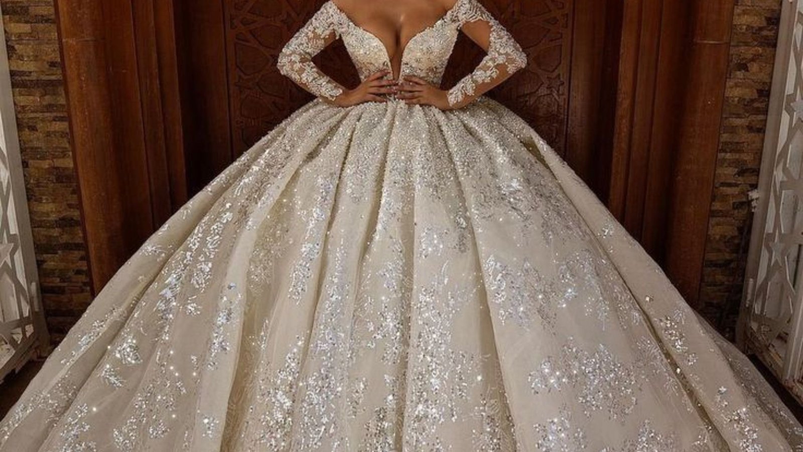 Elegant white ball gown adorned with sequins, showcasing a stunning design perfect for formal occasions.