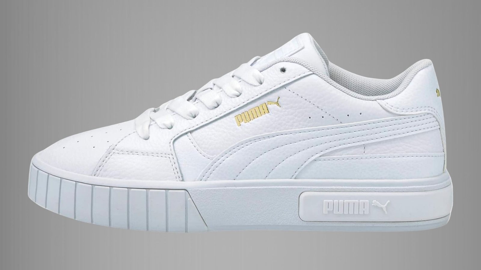 Puma Casket platform sneakers in black with a sleek design and elevated sole, perfect for casual and sporty outfits.