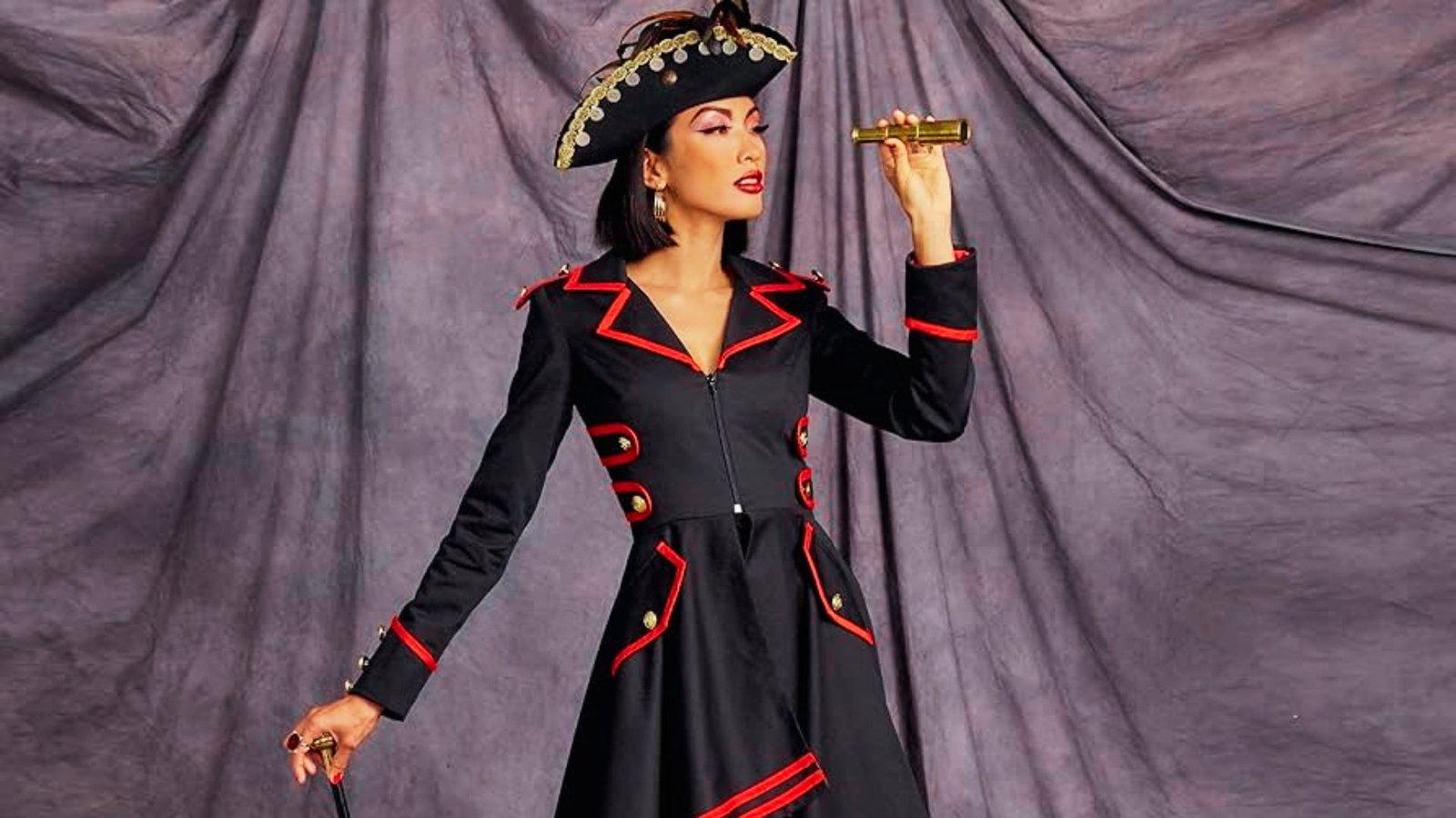 A woman in a steampunk outfit stands among numerous clocks, blending vintage style with a whimsical, mechanical atmosphere.
