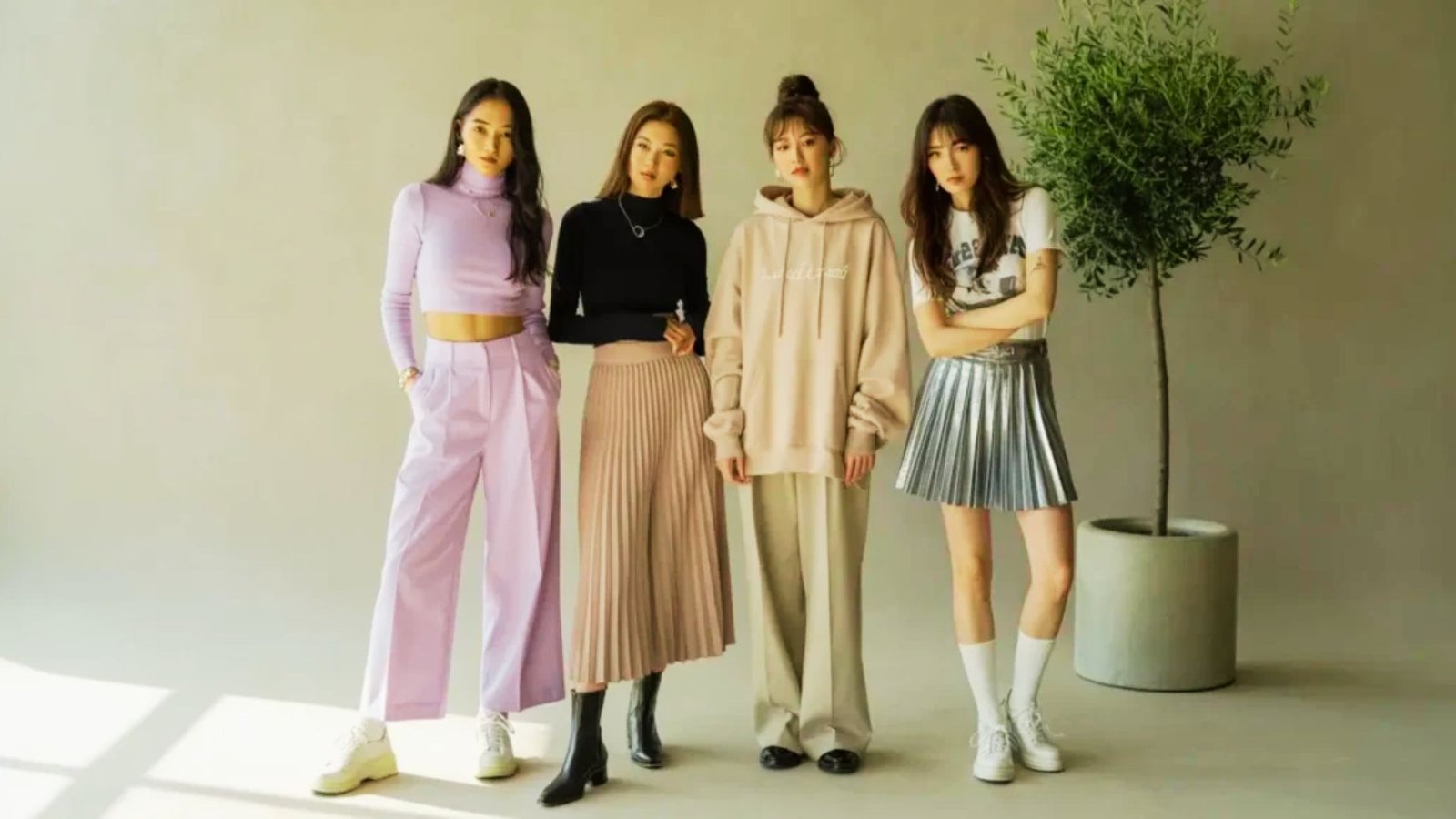 Four styles of women's pants and jackets displayed together, showcasing various colors and designs for different occasions.