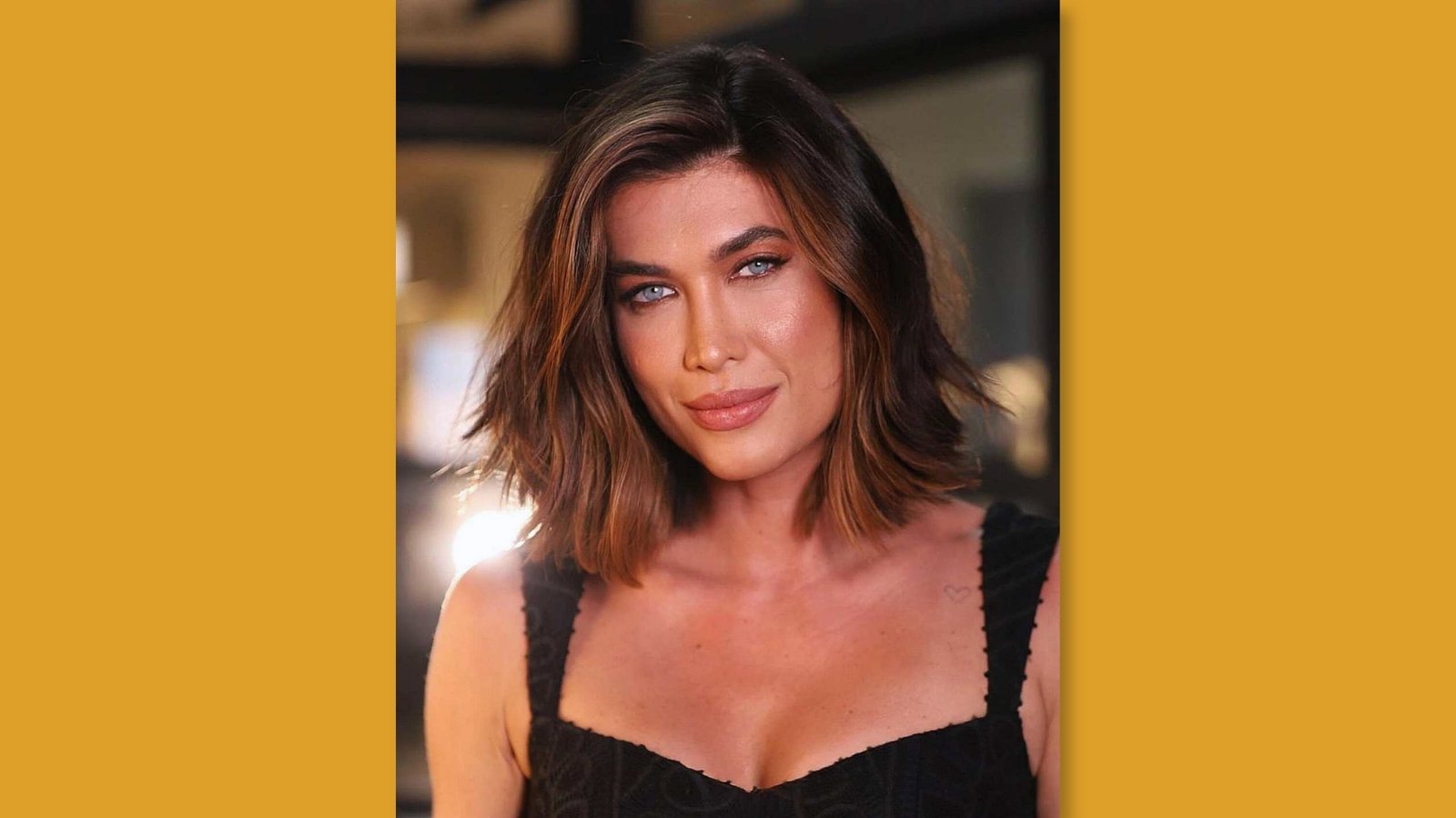 Low maintenance shoulder length layered lob with soft waves and face-framing highlights on brunette hair for round face
