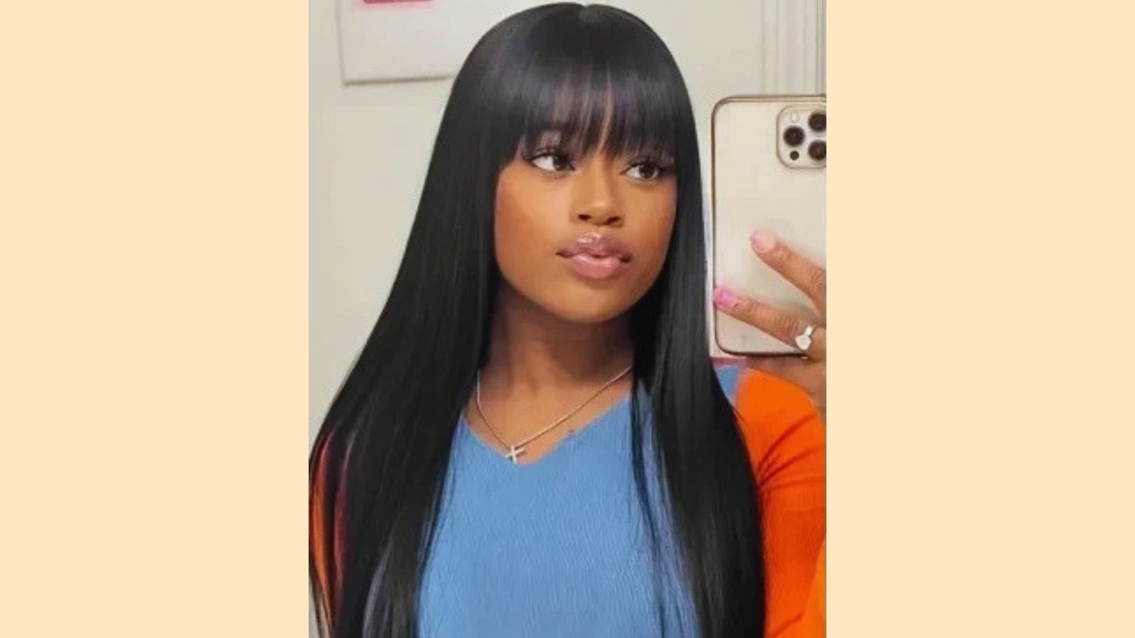 Long sleek straight black hair with wispy see-through bangs and glossy finish